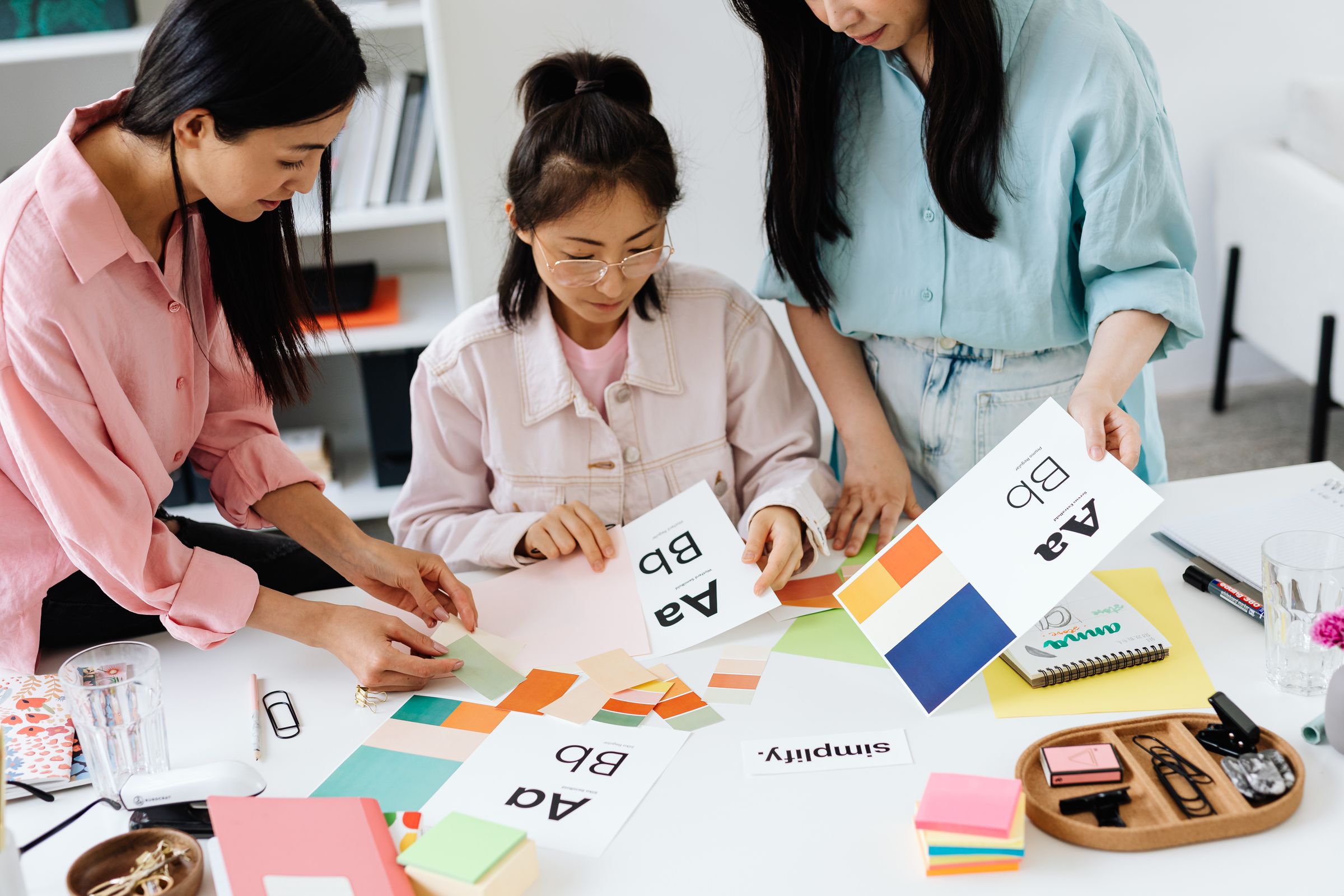 Brand design team reviewing colour and type samples